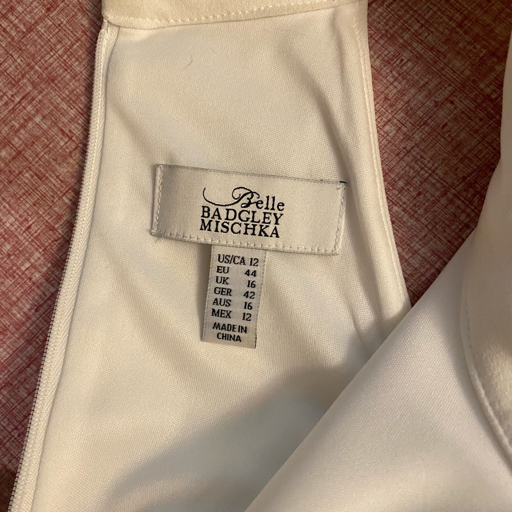Get engaged? I have two never-worn wedding dresses for you!